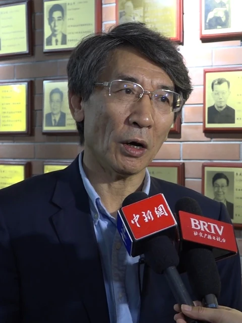 Qikun Xue