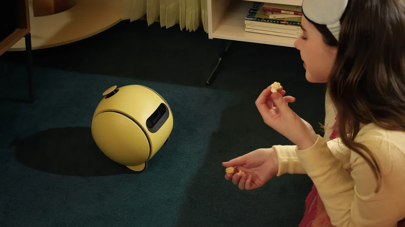 Samsung’s Ballie home robot interacting with a family in an official product demonstration; source: Samsung Electronics