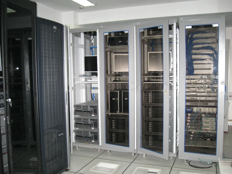 Rows of AI computing servers in a data centre, illustrating the infrastructure used to train large language models
