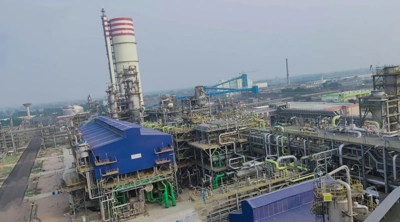 An Indian fertilizer production complex with industrial towers and piping