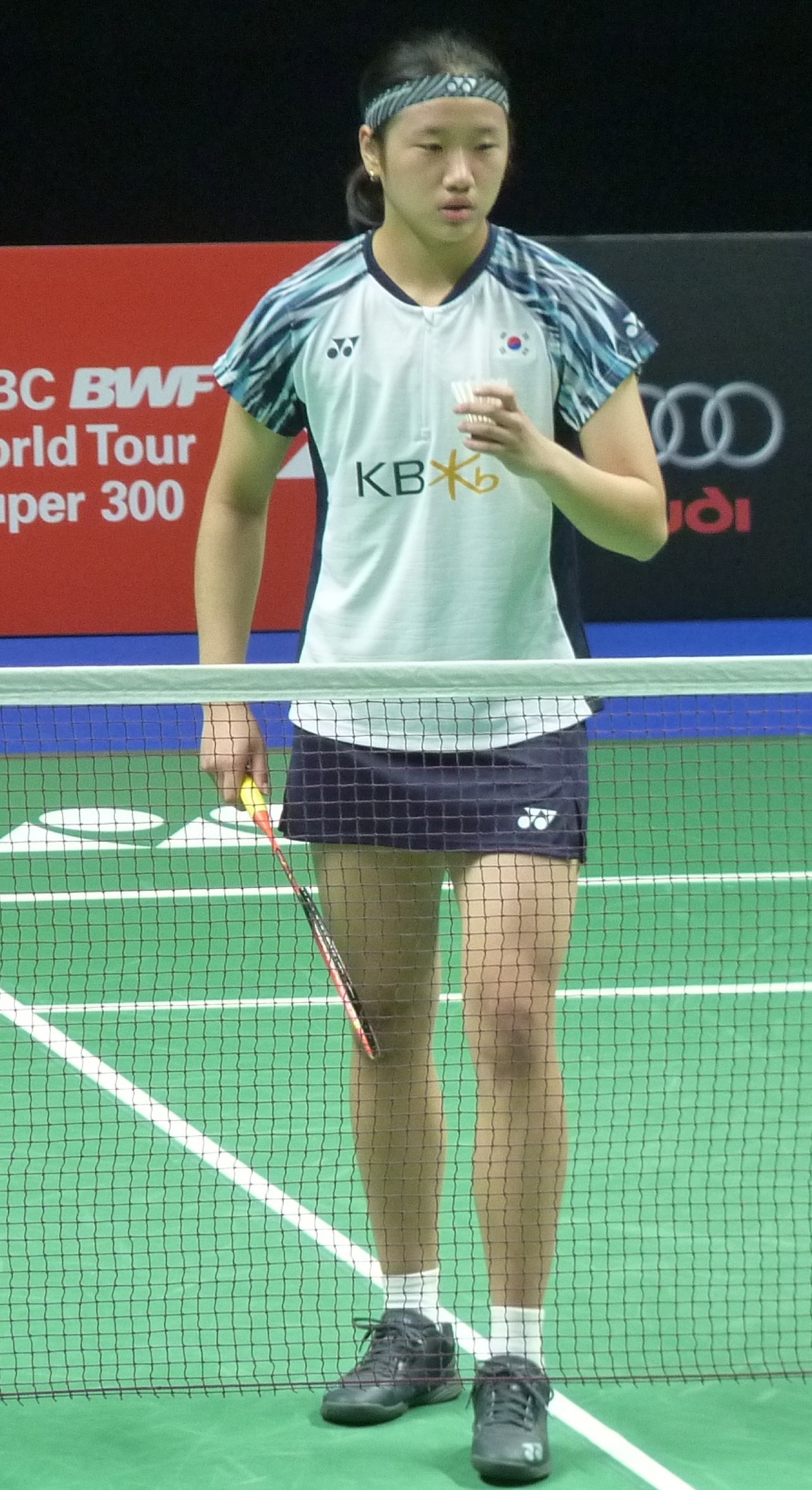 An Se-young on court during an international badminton match.
