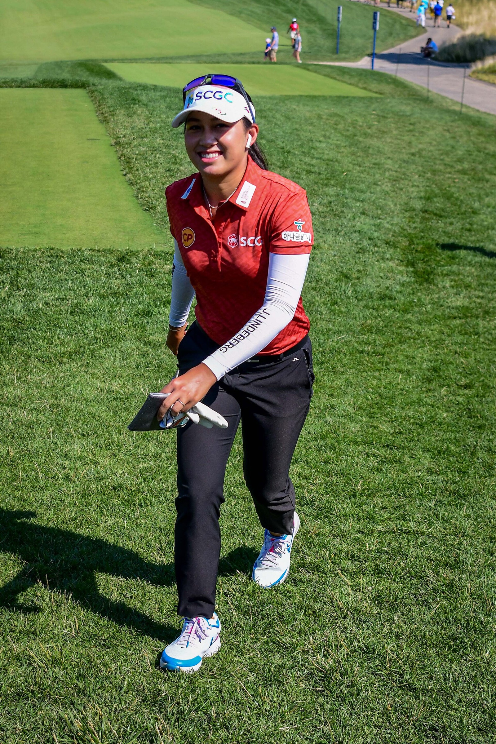 Jeeno Thitikul walking the course at the 2022 Women's PGA Championship.